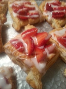 Add sliced fresh berries; brush with melted and cooled apple jelly.  Drizzle with a conf. Sugar drizzle.